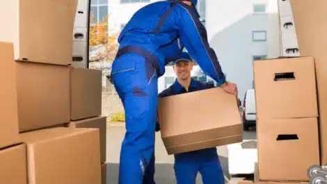 Movers Carrying Sofa