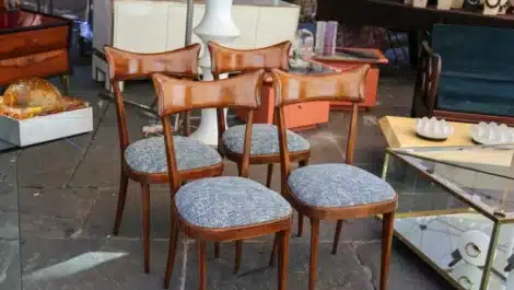 a set of chairs and other random items at an estate sale