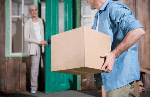 Elderly couple moving out of their house.