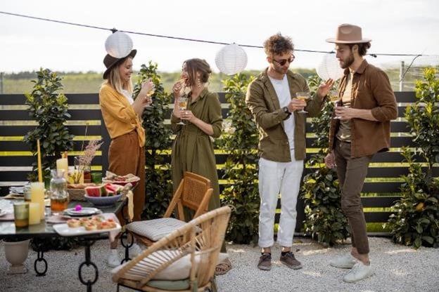 A group of friends in a backyard